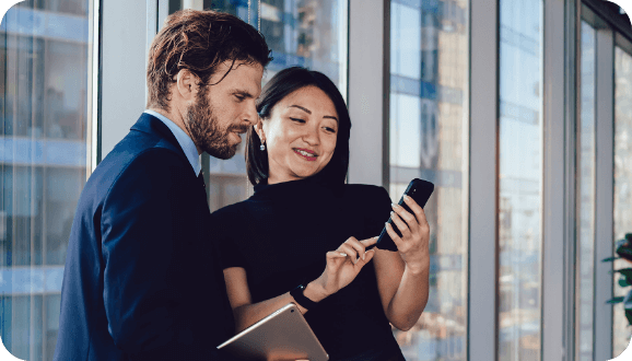 get-in-touch Man and woman looking in mobile device